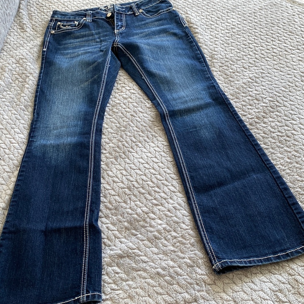 Love Nation jeans. Size 8. Studded pockets. Flare cut.